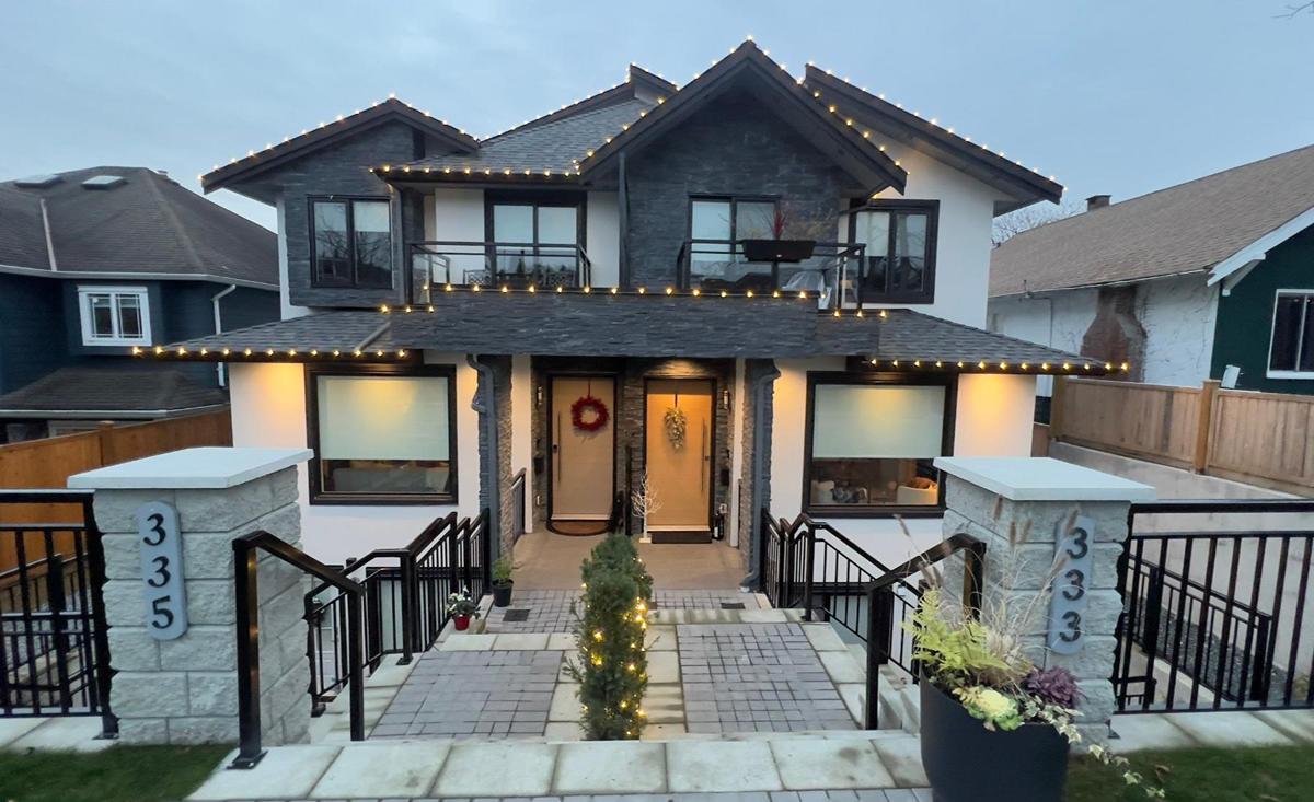 Beautiful Roofline Holiday Lighting installed in beautiful home